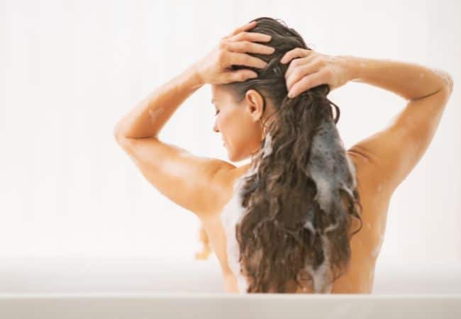 how to wash hair after applying coconut oil