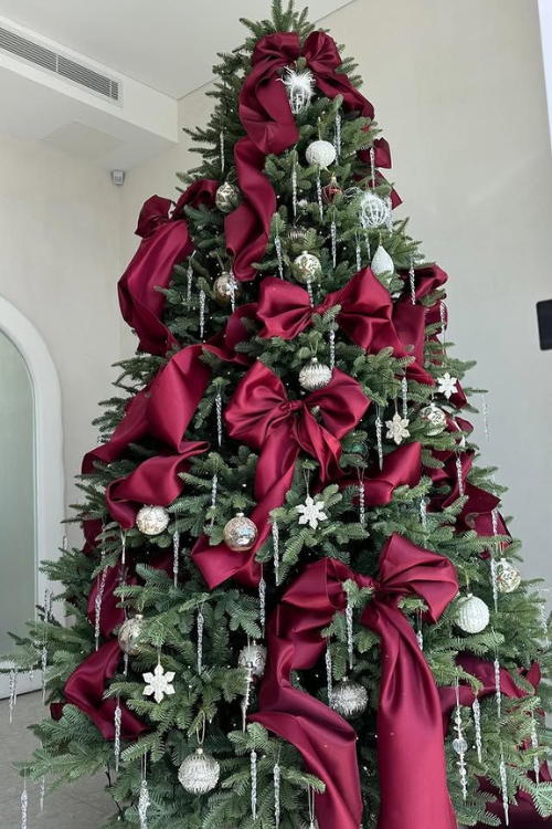 The 12 Red Christmas Trees Everyone’s Obsessed With This Season The 12 Red Christmas Trees Everyone’s Obsessed With This Season