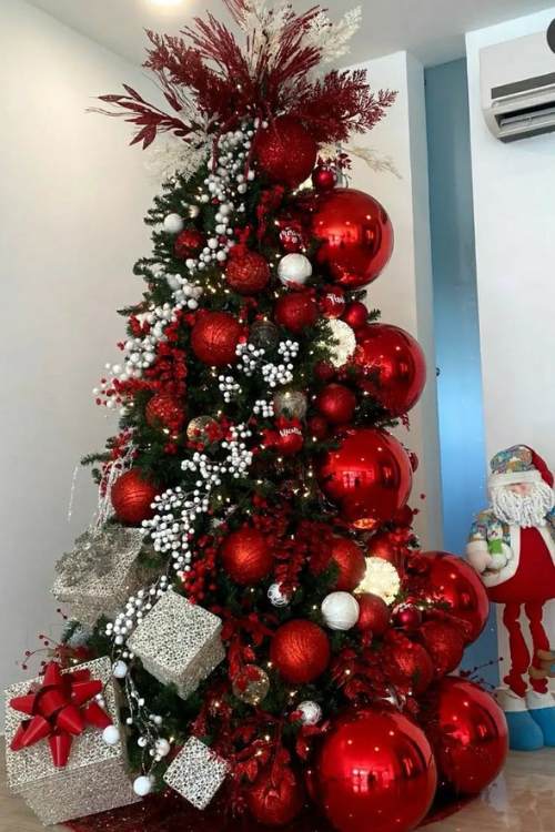 The 12 Red Christmas Trees Everyone’s Obsessed With This Season The 12 Red Christmas Trees Everyone’s Obsessed With This Season