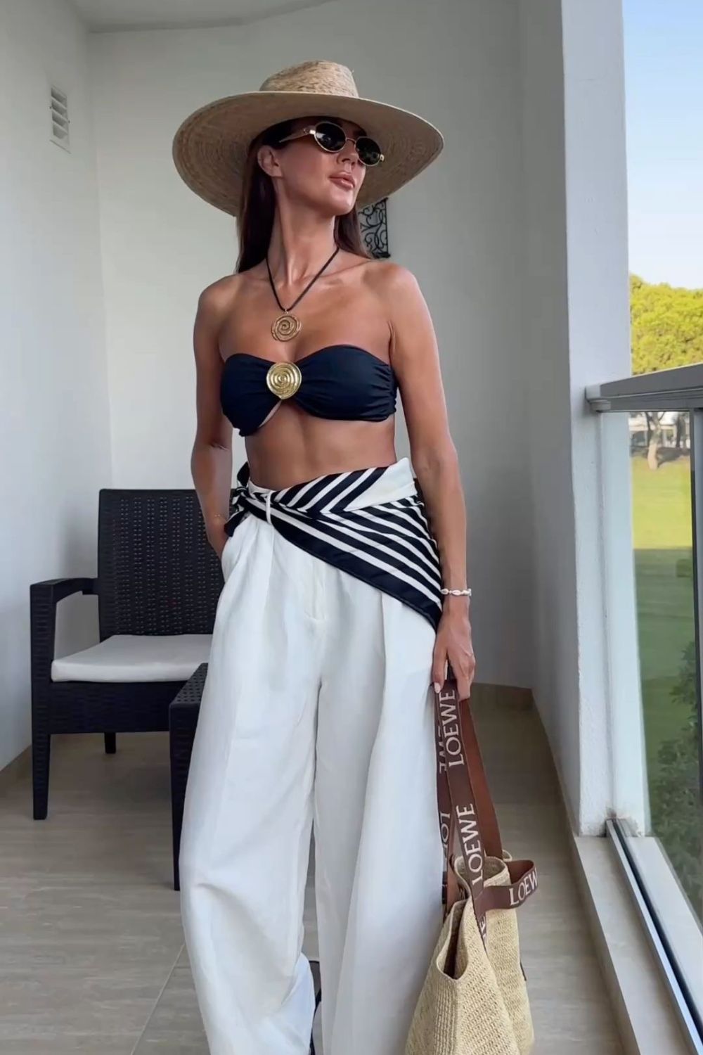 Monochromatic bikini with tailored pants