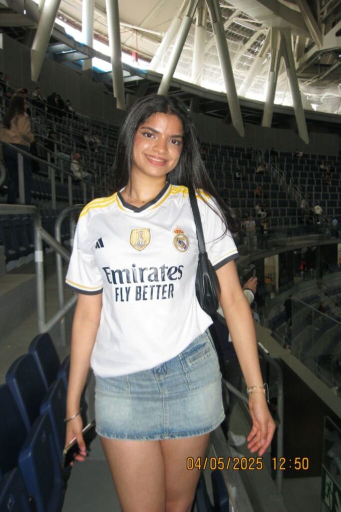 18 Football Jersey Outfits You’ll Want to Wear Even When You’re Not at a Game stadium glam with denim skirt